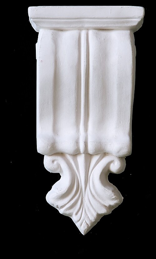 Fluted drop fibrous plaster corbel with acanthus tip