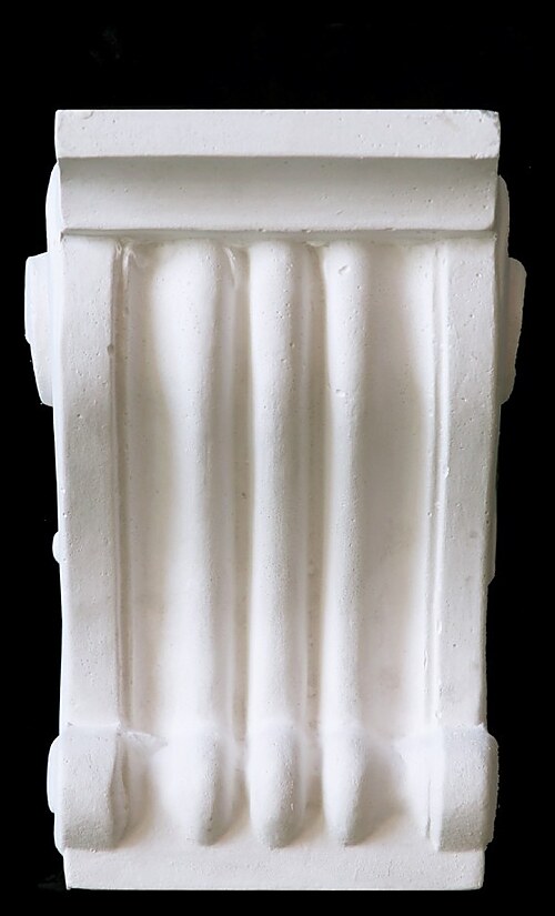 Fluted column fibrous plaster corbel