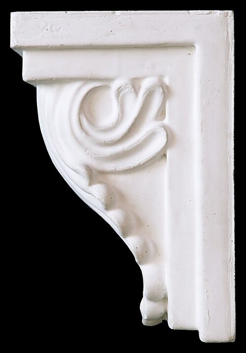 S-scroll fibrous plaster corbel